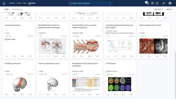 Discover feed showing community Cards with social interaction options